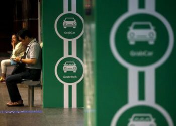 Kemitraan Grab & PT KAI Sedia Transportasi Terintegrasi di Stasiun Jabodetabek