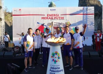 Sambut Obor Api Asian Games XVIII  Telkom Gelorakan Energi Merah Putih di Bali