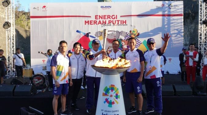Sambut Obor Api Asian Games XVIII Telkom Gelorakan Energi Merah Putih di Bali