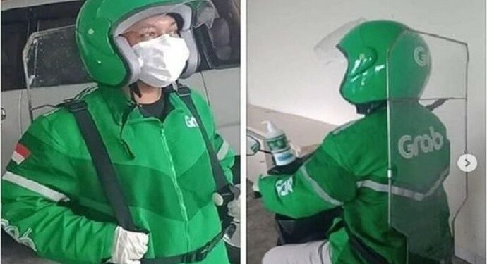 Pengemudi Ojek Grab Wajib Selfie dan Pakai Partisi