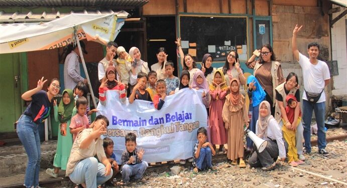 komunitas Rangkul Tangan