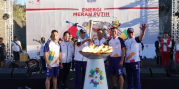 Sambut Obor Api Asian Games XVIII  Telkom Gelorakan Energi Merah Putih di Bali