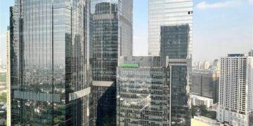 Grab Konsolidasikan Saham Superbank