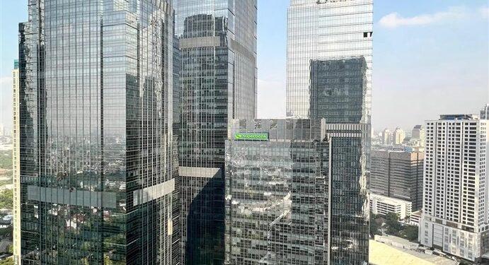 Grab Konsolidasikan Saham Superbank