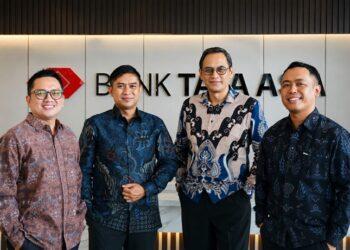 Laba bersih Bank Tata Asia