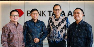 Laba bersih Bank Tata Asia