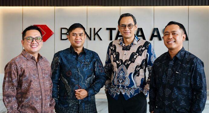 Laba bersih Bank Tata Asia